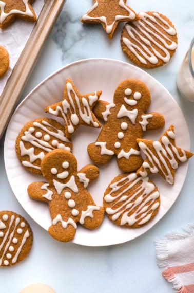 healthy gingerbread cookies on a white plate.