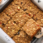 pan of apple baked oatmeal sliced and labeled for Pinterest.