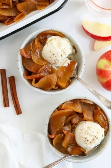 baked apples served with spoons