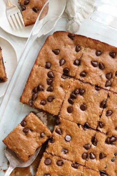 banana snack cake sliced in pan.