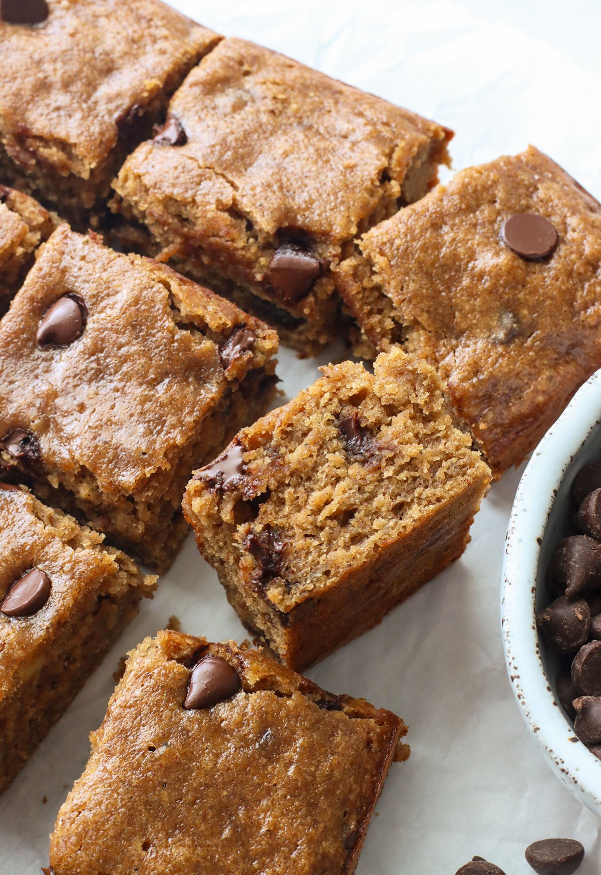 close up of a banana chocolate chip bar on its side. 