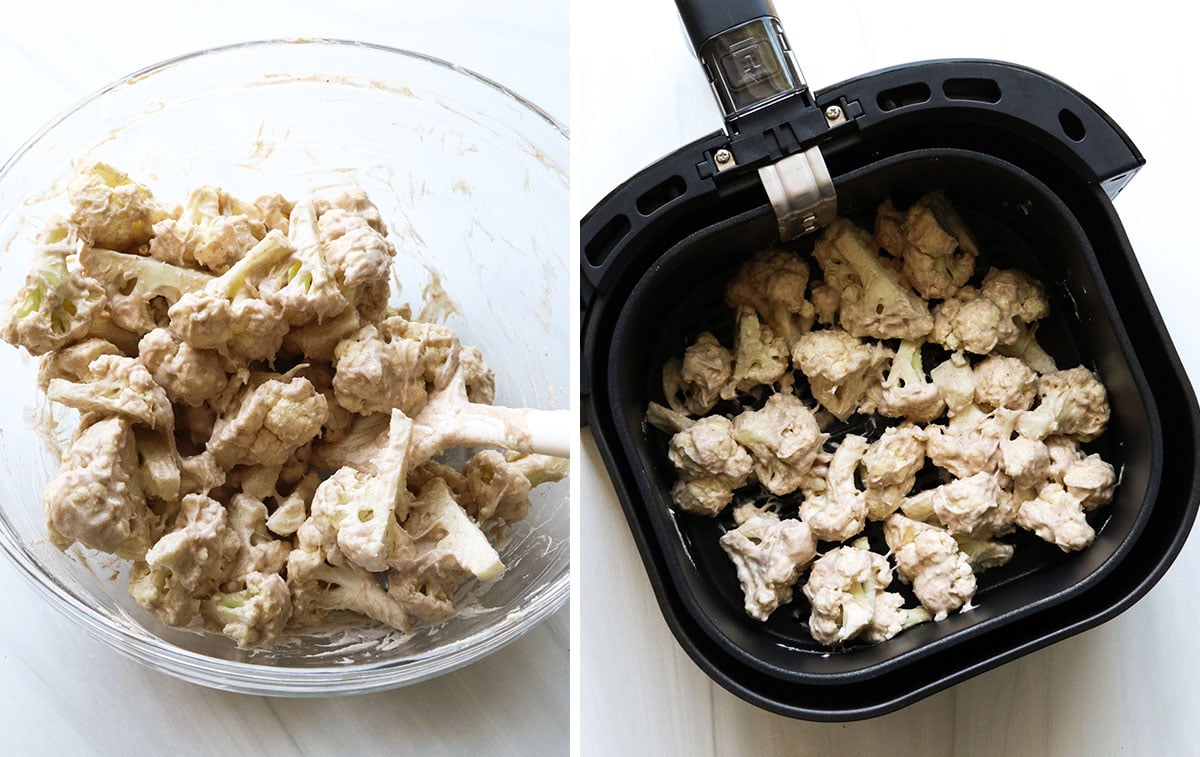 battered cauliflower arranged in an air fryer basket.