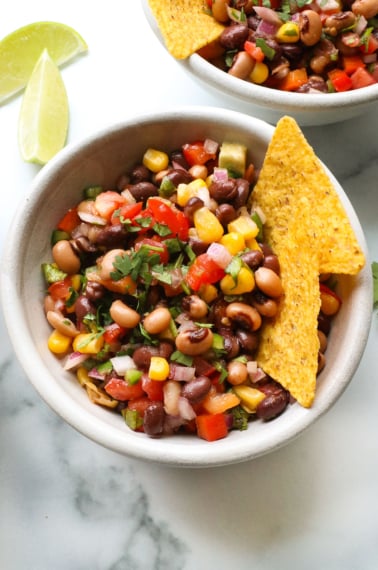 cowboy caviar closeup with corn tortilla chips.