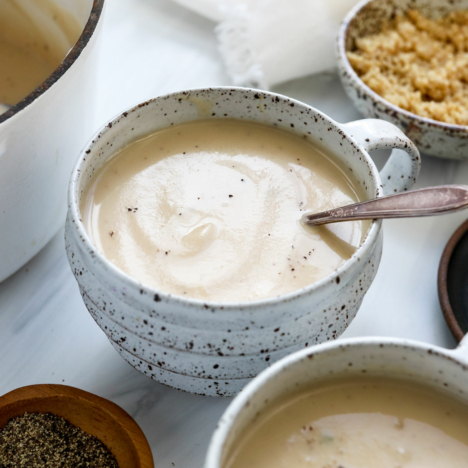 cauliflower soup in white mugs