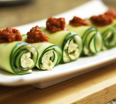 Cucumber roll ups with sun-dried tomato sauce