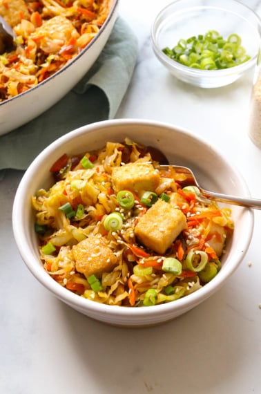 vegan egg roll in a bowl served in white bowl.