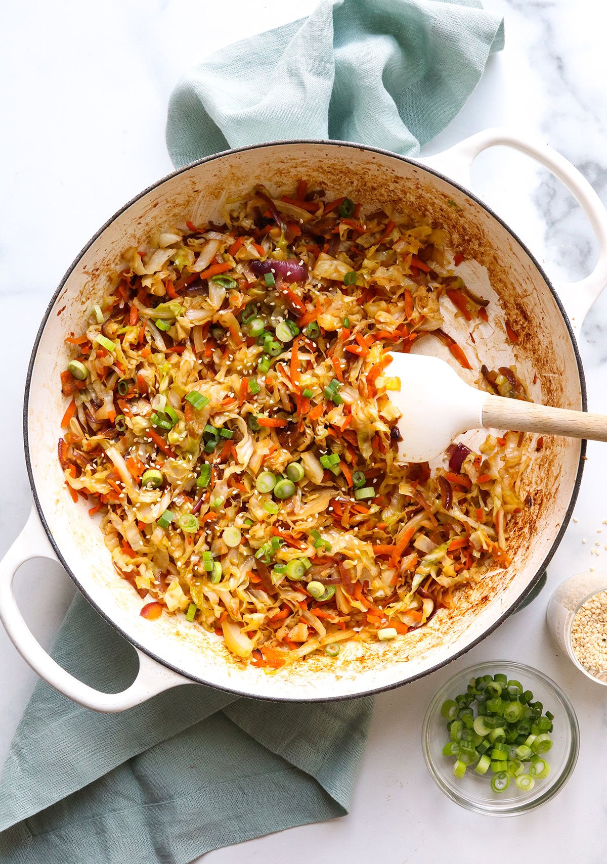 egg roll stir fry in a white skillet.