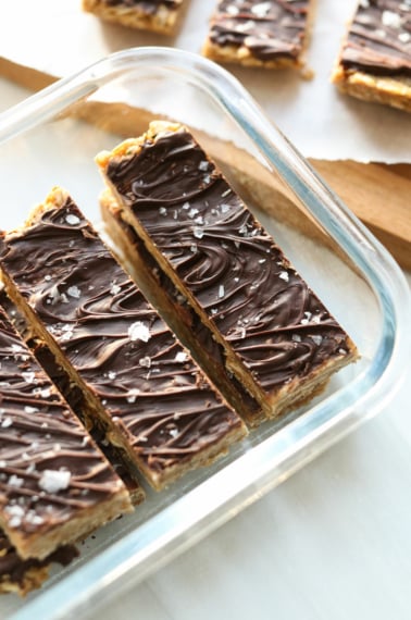 chocolate covered granola bars in storage container.