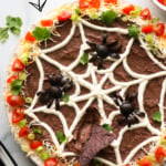 spider web bean dip platter labeled for Pinterest.