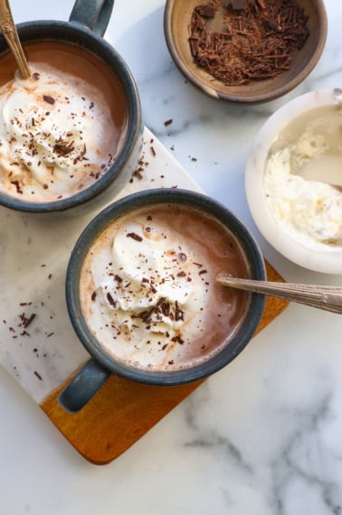 healthy hot chocolate topped with whipped cream and shaved chocolate.