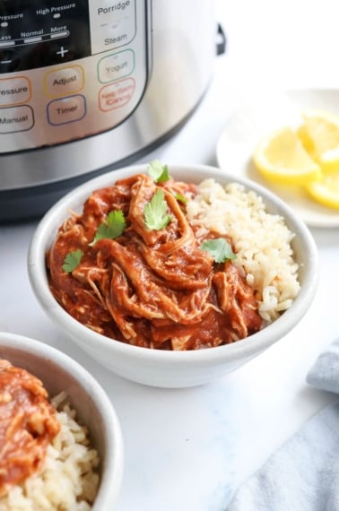 instant pot butter chicken in bowl with rice