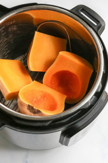 butternut squash cut into 4 pieces in pressure cooker