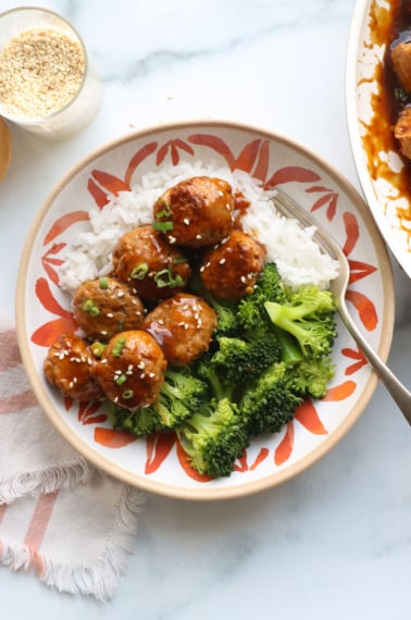 turkey meatballs in kung pao sauce with broccoli and rice.