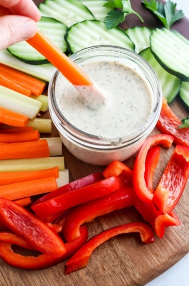 carrot dipped in vegan ranch dressing